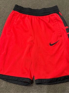 Nike Men's Red Athletic Shorts with Black Waistband and Trim